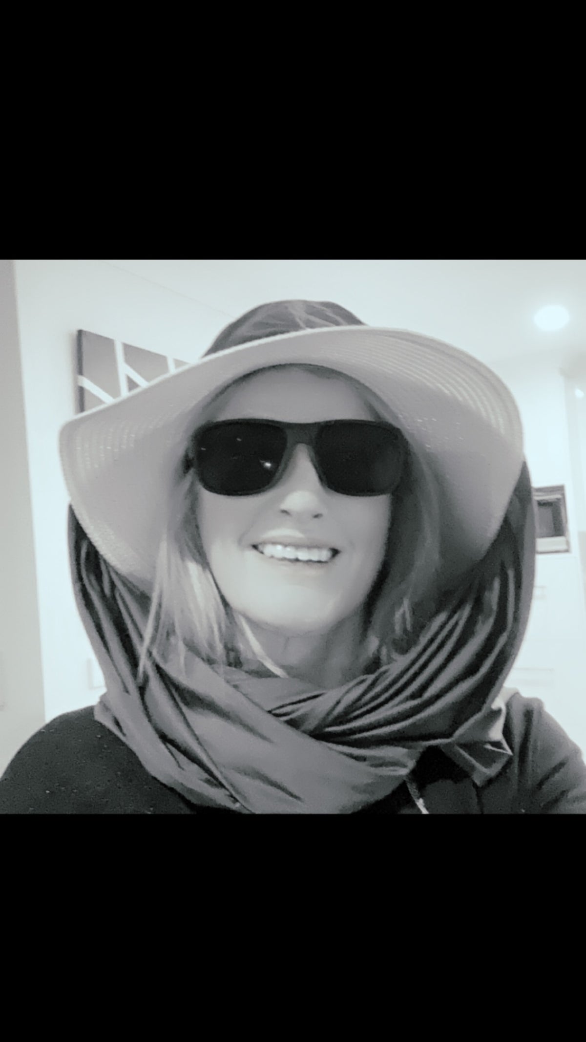 Linda wearing Black Sun Wrap