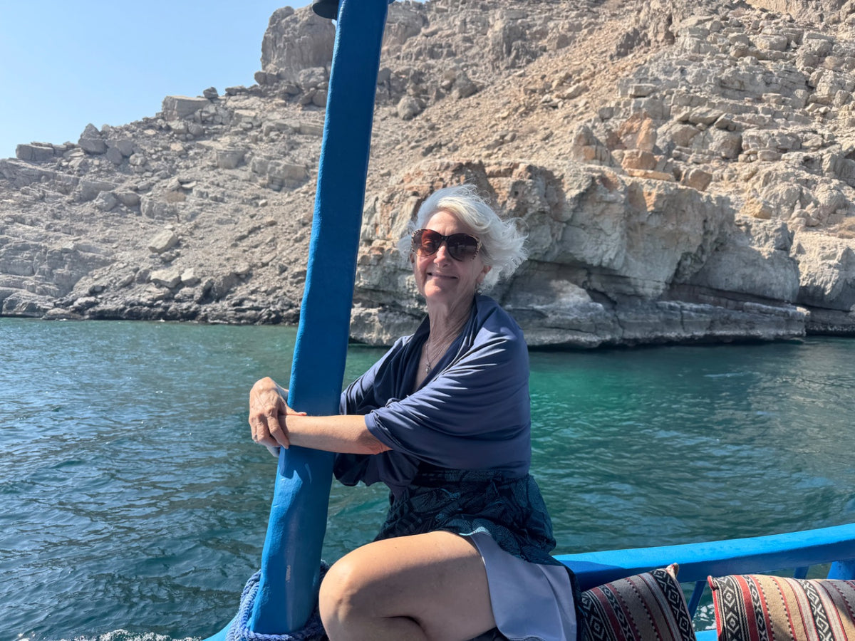 Julie wearing Navy Peony Sun Wrap