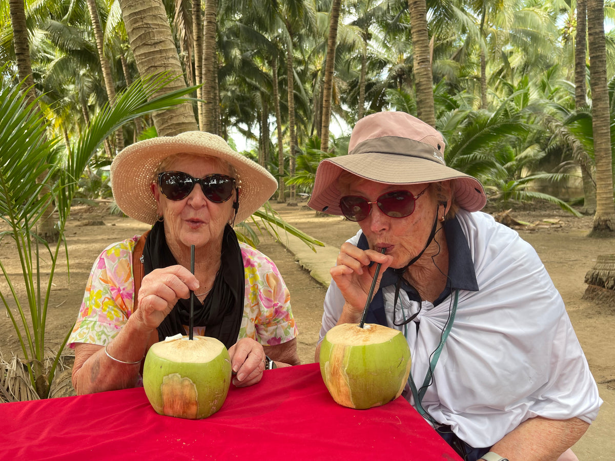 Margaret P and friend wearing sun wrap