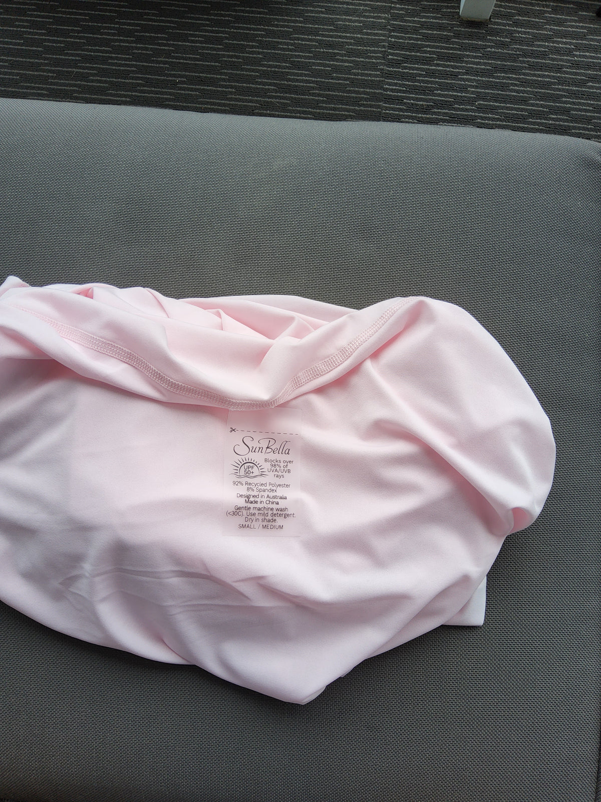 Nancy wearing Marshmallow Pink Sun Wrap