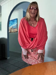 Rosemary wearing Sugar Coral Sun Wrap
