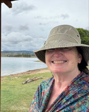 Sarah wearing the Rainbow Bee Eaters Sun Wrap in M/L