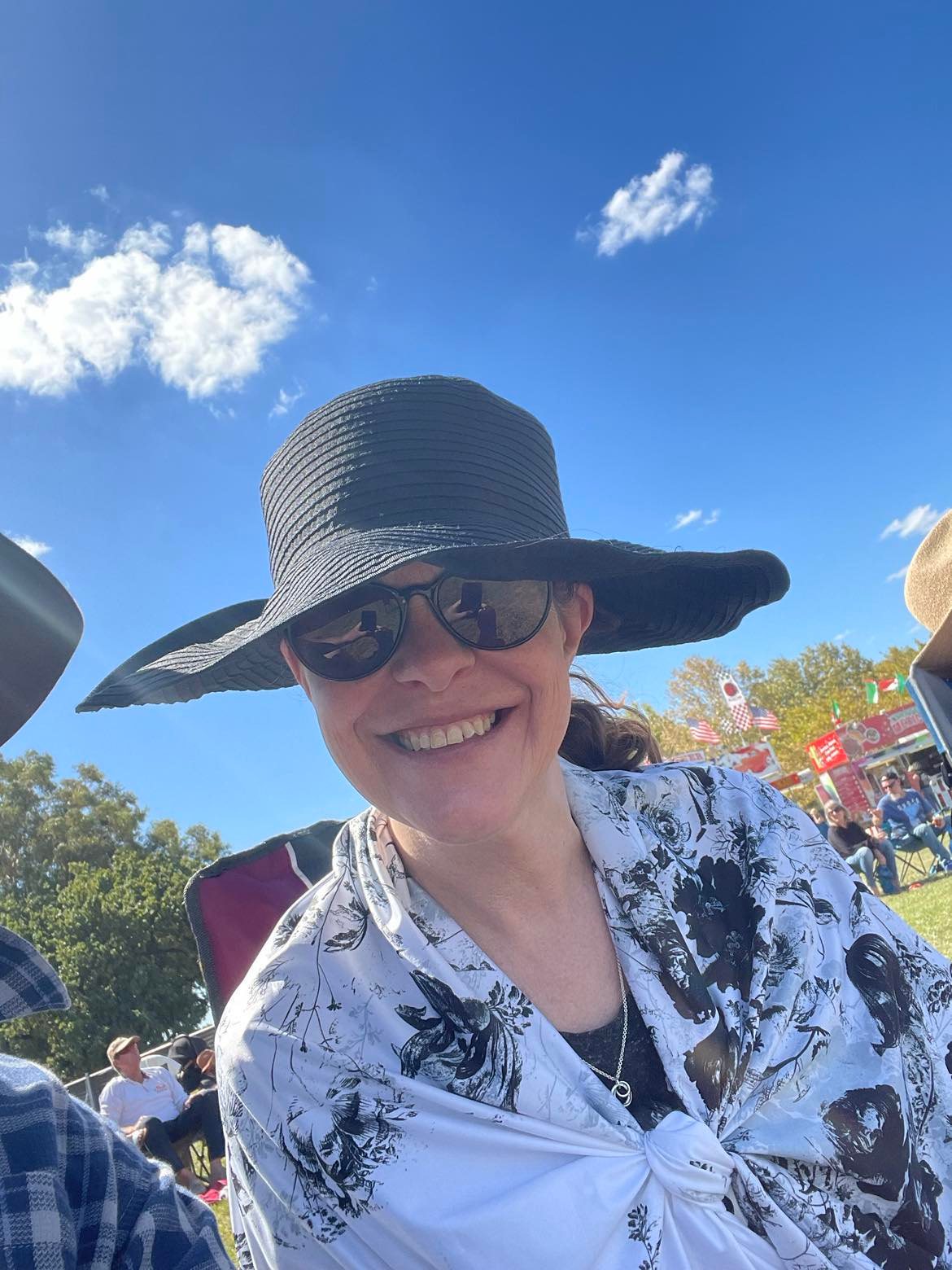 Sheridan wearing Midnight Blossoms Sun Wrap
